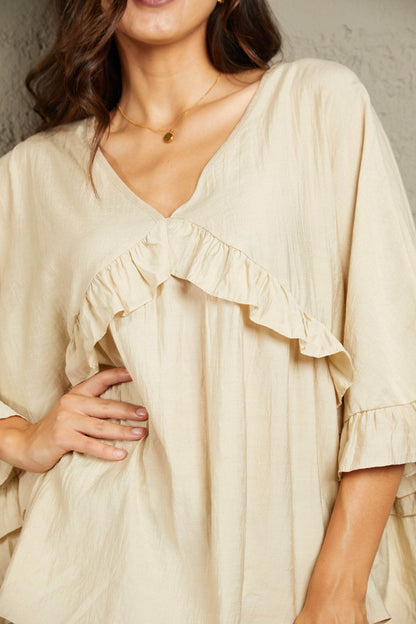 Ruffled V-Neck Half Sleeve Blouse Trendsi c7e99316ce6f4efdbc3b17b8e573af5b-Max