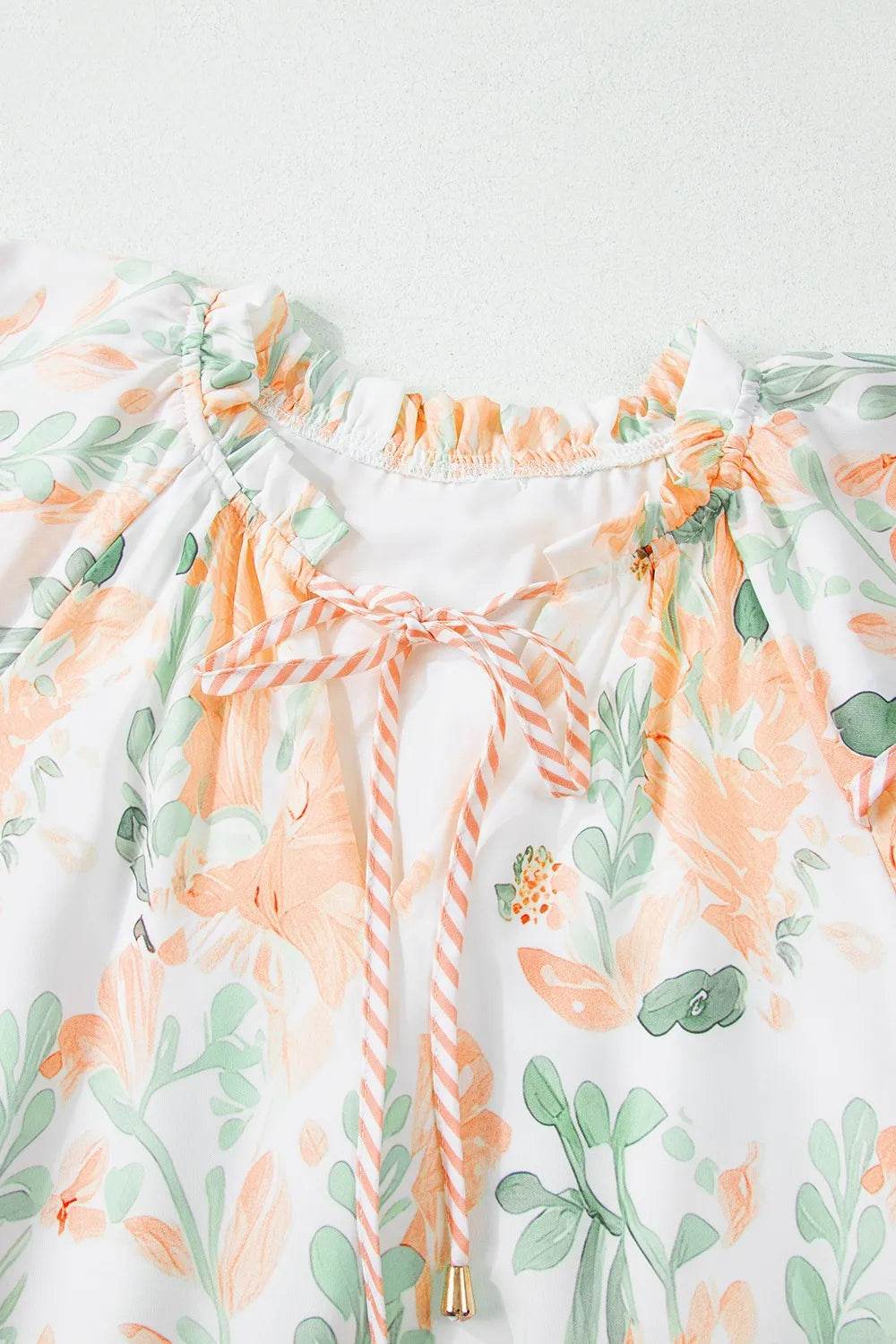 Floral Tie Neck Layered Short Sleeve Dress Trendsi ccc332cc-008d-4b3c-9613-1e8b778c4f8e-Max-Origin