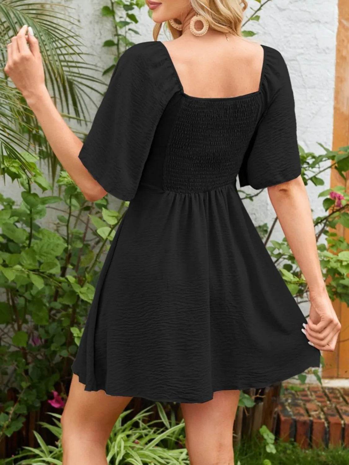 Smocked Back Knotted Flutter Sleeve Dress Trendsi d3404620-3c29-4c0f-afe8-ef4005c7e105-Max-Origin
