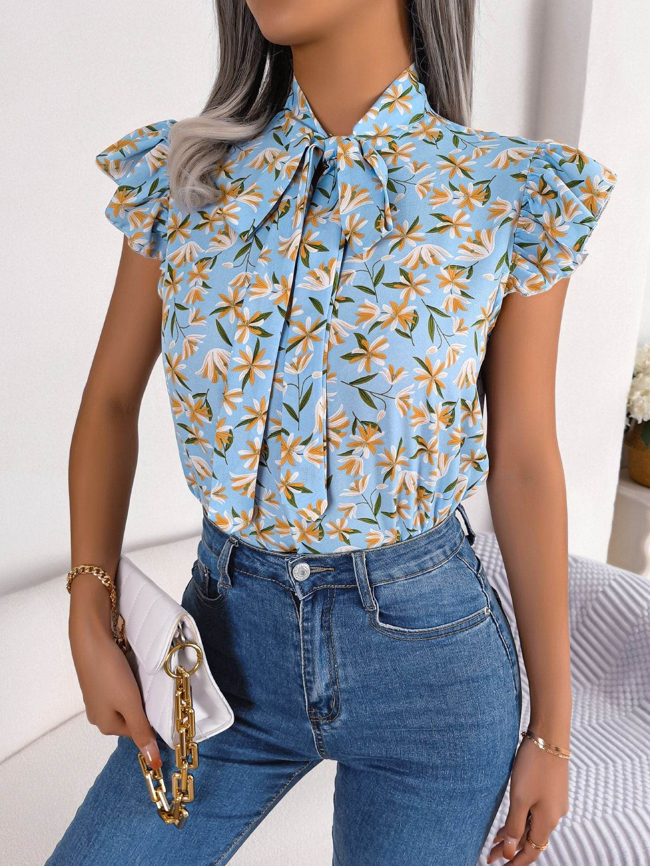 Floral Tie Neck Flutter Sleeve Blouse Light Blue Trendsi d3845c81bb304b7b81df4da9e5172633-Max