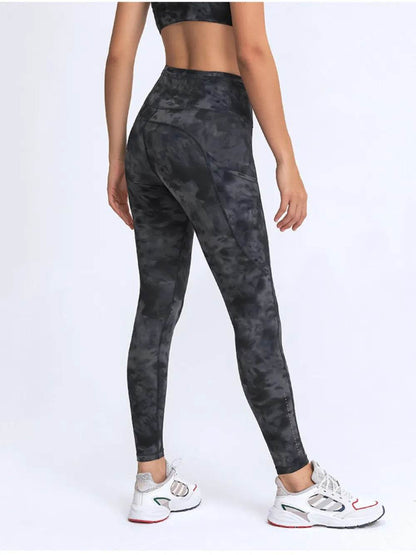 Millennia Wide Waistband Leggings with Pockets Trendsi d3921ce79cd949cabb75adf493e41657-Max