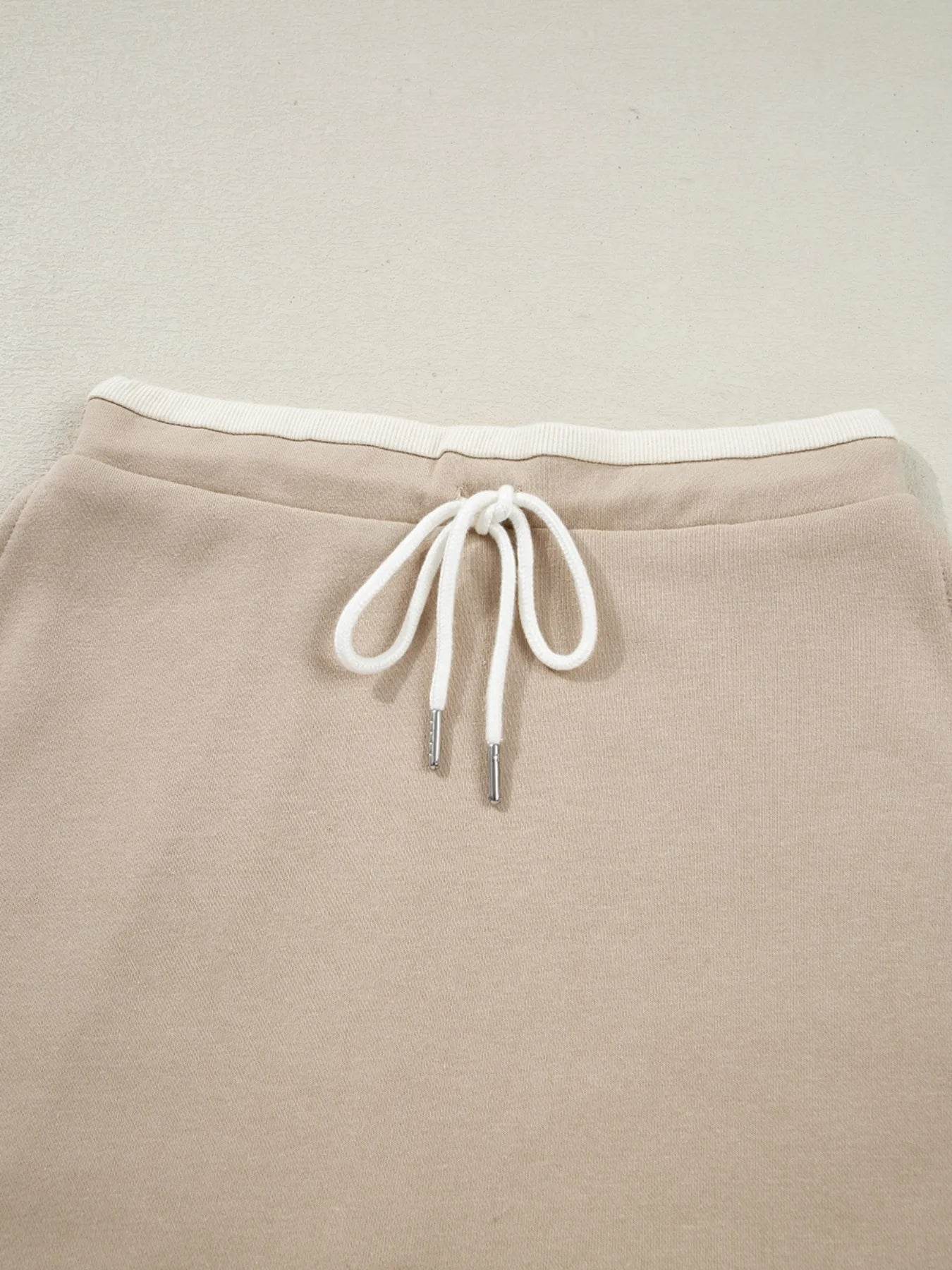 Contrast Collared Neck Top and Drawstring Mini Skirt Set Trendsi d4f072af-2b58-407c-9b10-47eeb390d103-Max-Origin