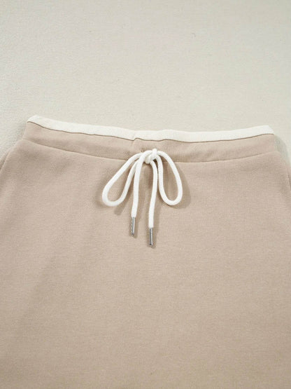 Contrast Collared Neck Top and Drawstring Mini Skirt Set Trendsi d4f072af-2b58-407c-9b10-47eeb390d103-Max-Origin