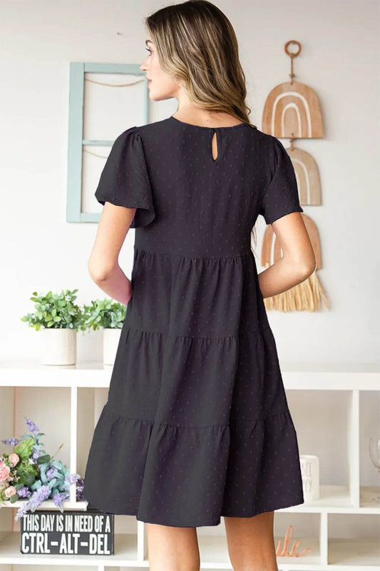 Heimish Swiss Dot Short Sleeve Tiered Dress Trendsi d807b521-268d-4f57-a8b1-515f2b446d08-Max