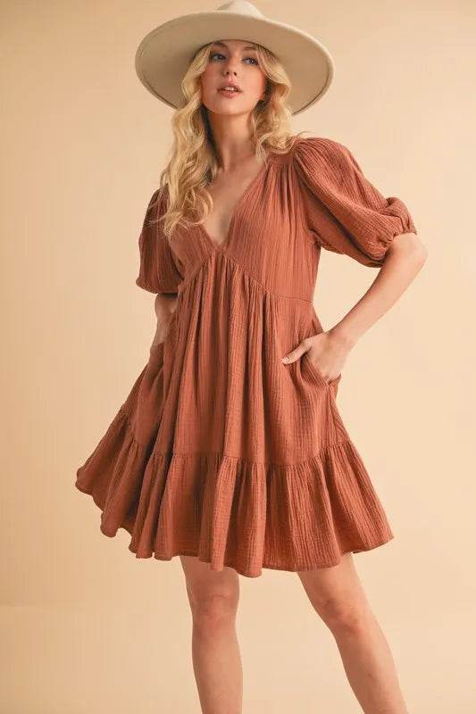 Aemi+Co Tied Back Ruffled Short Sleeve Mini Dress Trendsi ddc580ae2e984c248d8d2ba95d256f5a-Max-Origin