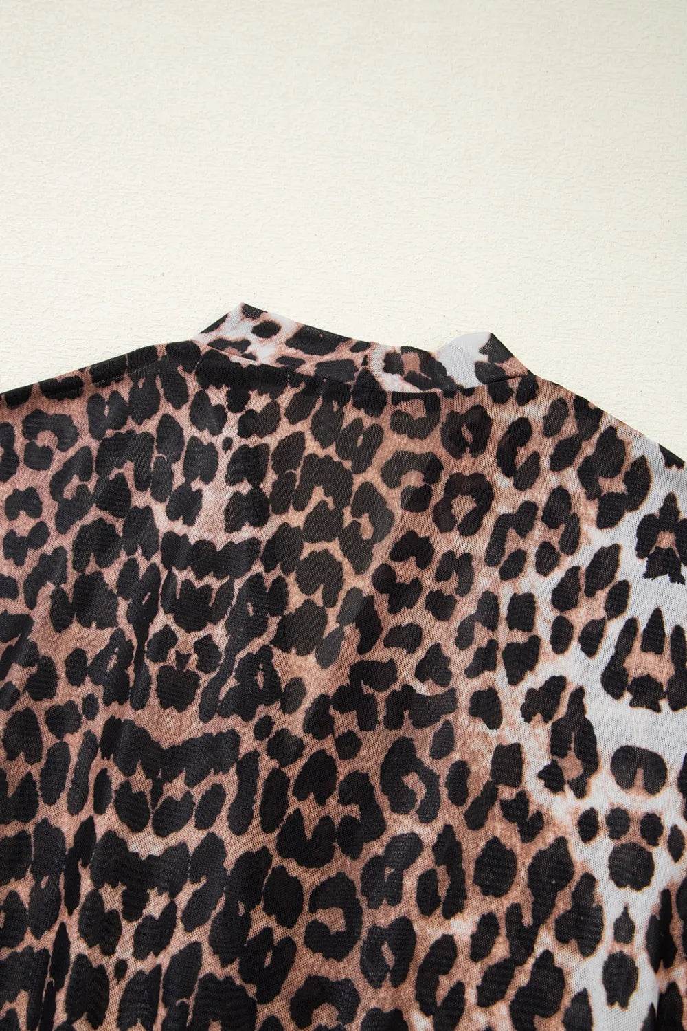 Leopard Wrapped V Neck Slim Short Sleeve Top Trendsi df18ce5e-f617-44ee-afa9-c68ccb2f2960-Max-Origin