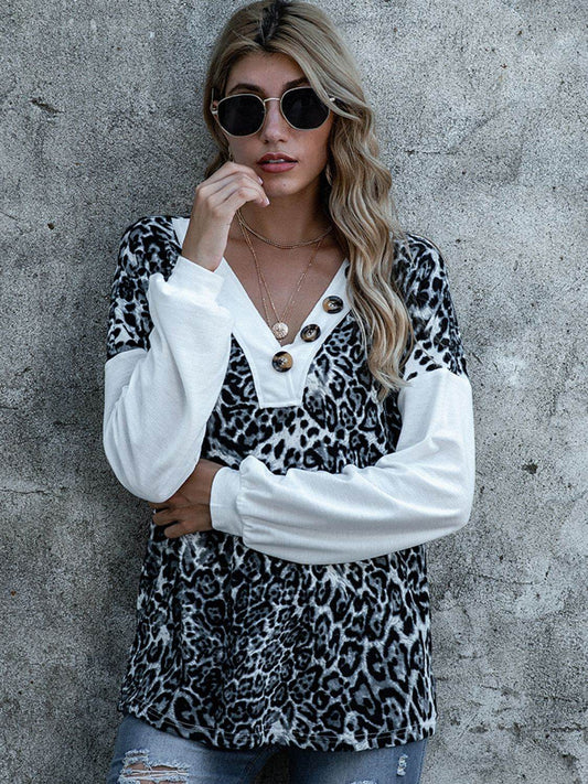 Shiny Leopard Decorative Button V-Neck Top Leopard Trendsi e0b9b0a81c3a45c69b6efc87ea9d98b7-Max
