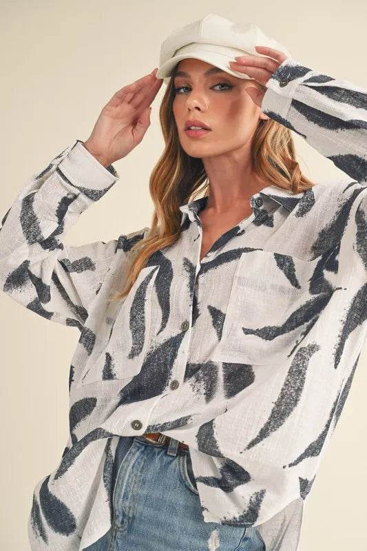Aemi + Co High-Low Printed Button Up Long Sleeve Shirt Trendsi e482f5a6-f3a7-4665-97e1-fbb653a102d2-Max