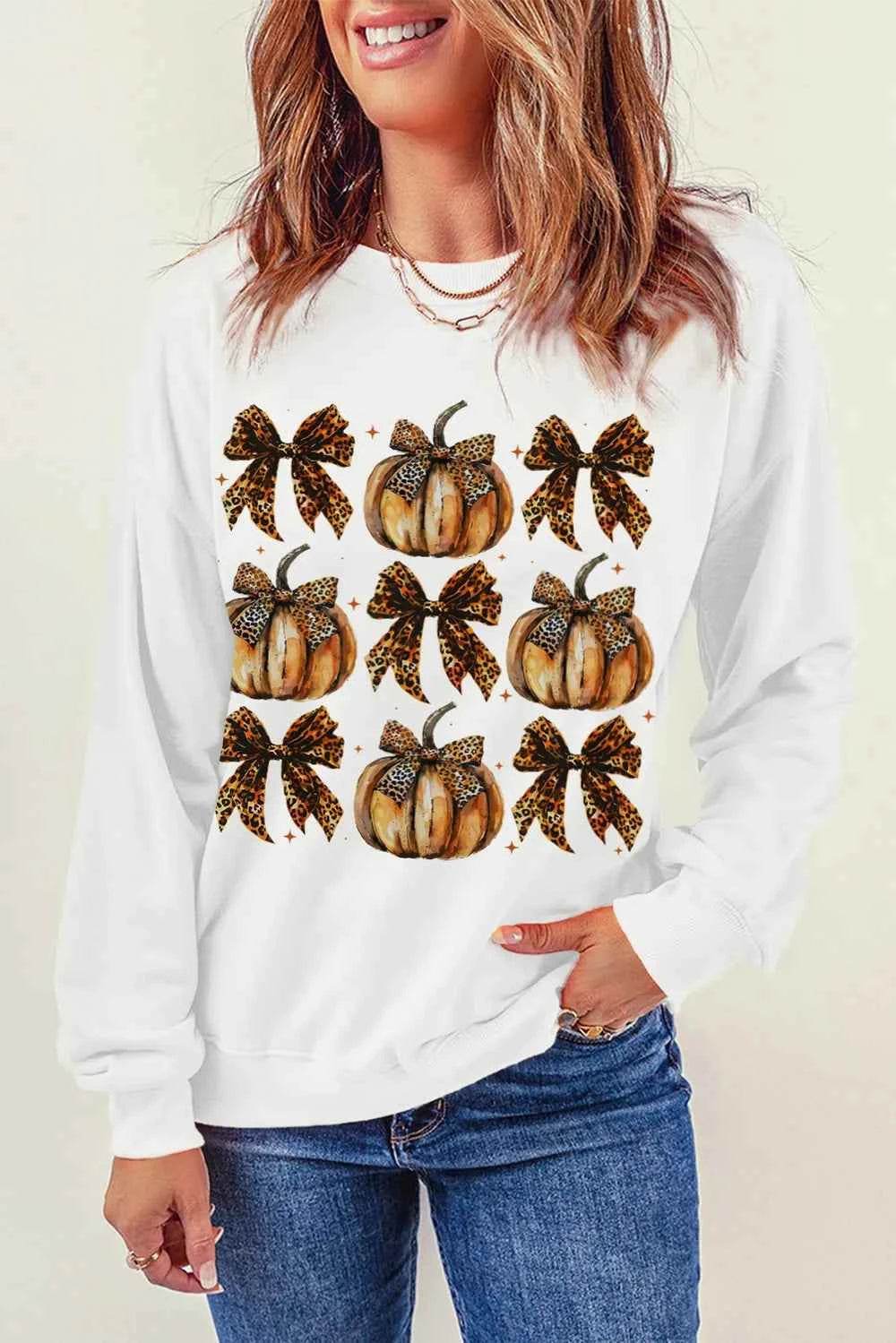 Pumpkin & Bow Graphic Long Sleeve Sweatshirt Trendsi f2c220dc-43be-4af2-b9f6-fdc4c7df0402-Max