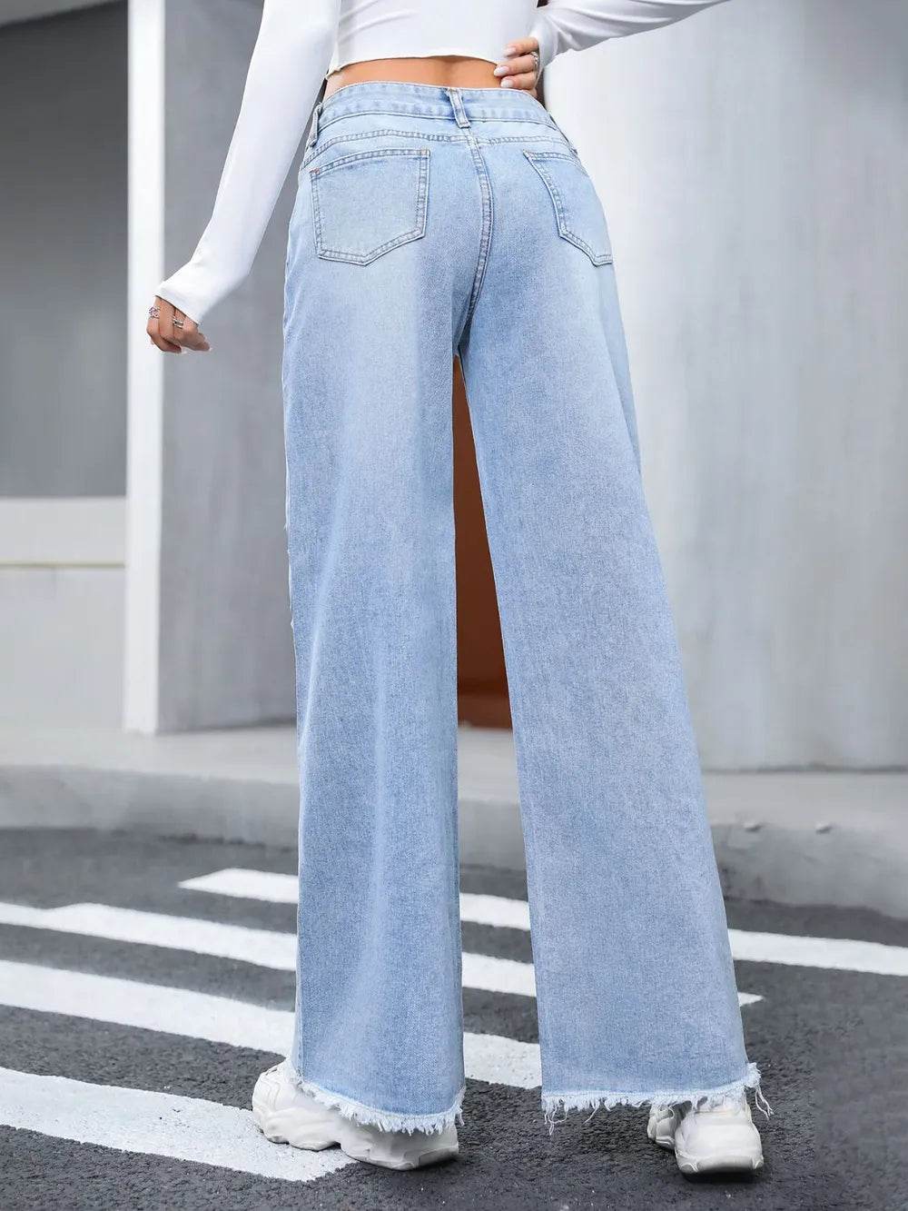Distressed Raw Hem Wide Leg Jeans Trendsi f638a66b-69b9-4fa5-8078-0fba526e99e6-Max