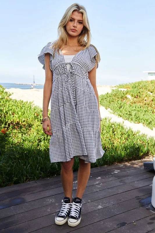 Davi & Dani Jacquard V-Neck Flutter Cap Sleeve Tiered Dress Trendsi f68ce2aef6ab42e192cd5b4322380d79-Max-Origin