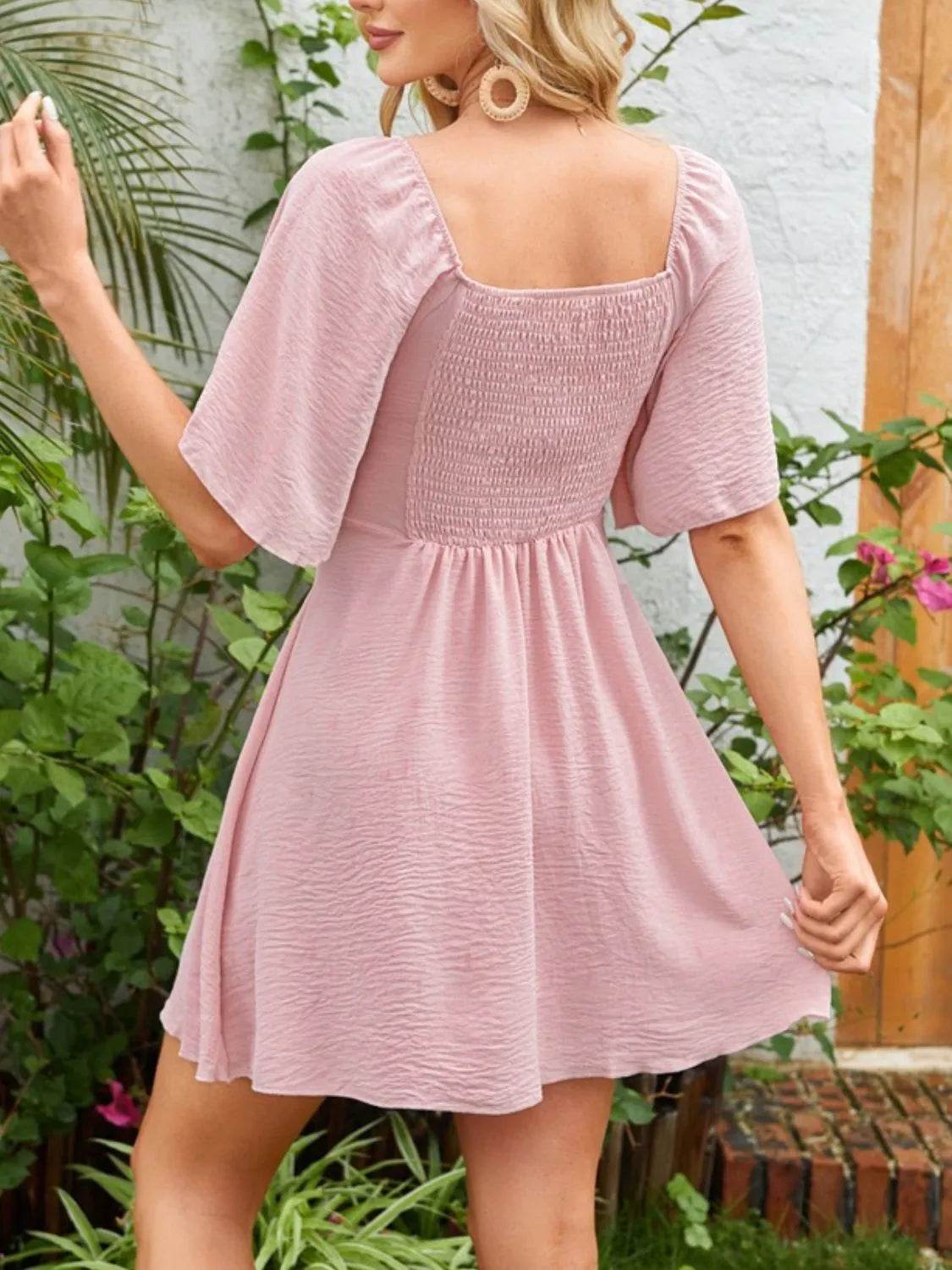 Smocked Back Knotted Flutter Sleeve Dress Trendsi f8b12dd8-ced0-490f-b1bd-4886940448a6-Max-Origin