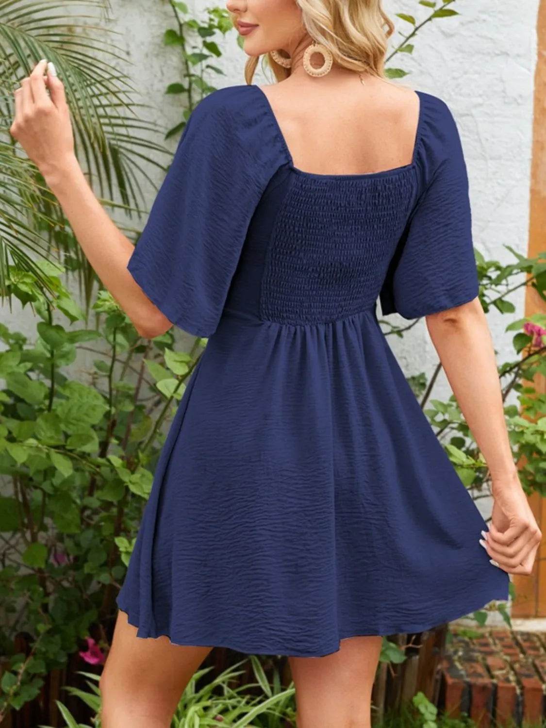 Smocked Back Knotted Flutter Sleeve Dress Trendsi f9f86fa2-905f-472f-88d7-1d48cfc7a1e8-Max-Origin