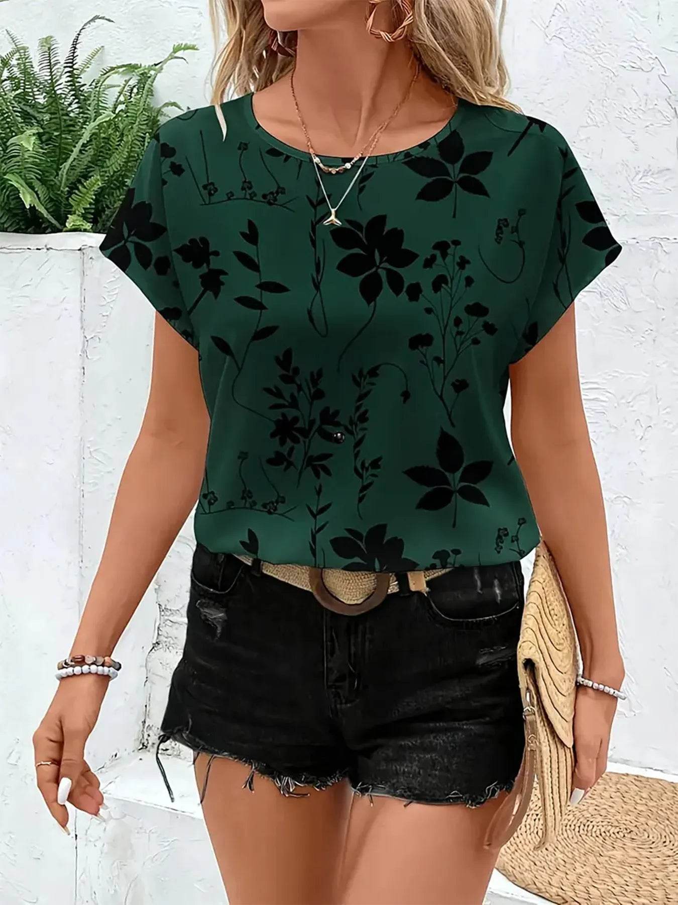 Printed Round Neck Short Sleeve Blouse Trendsi fc957e6737ef4284a5c46b4126b6c332-Max-Origin