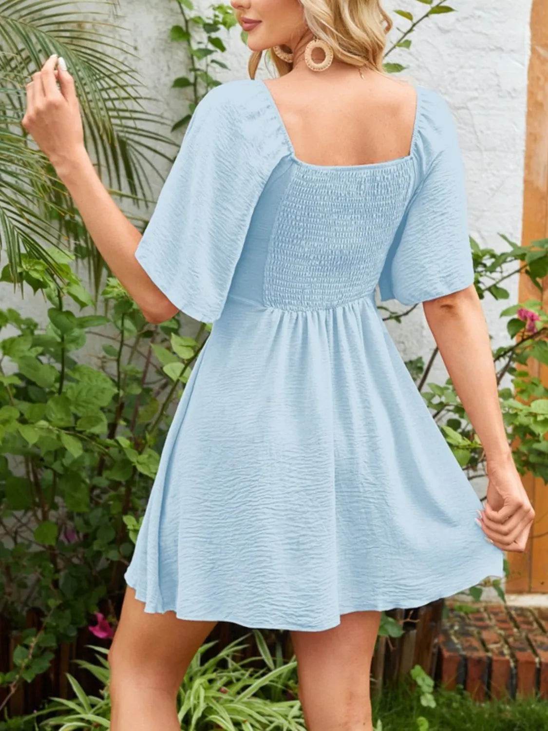 Smocked Back Knotted Flutter Sleeve Dress Trendsi feef86ce-13e8-47fe-8df7-0fd06501879c-Max-Origin